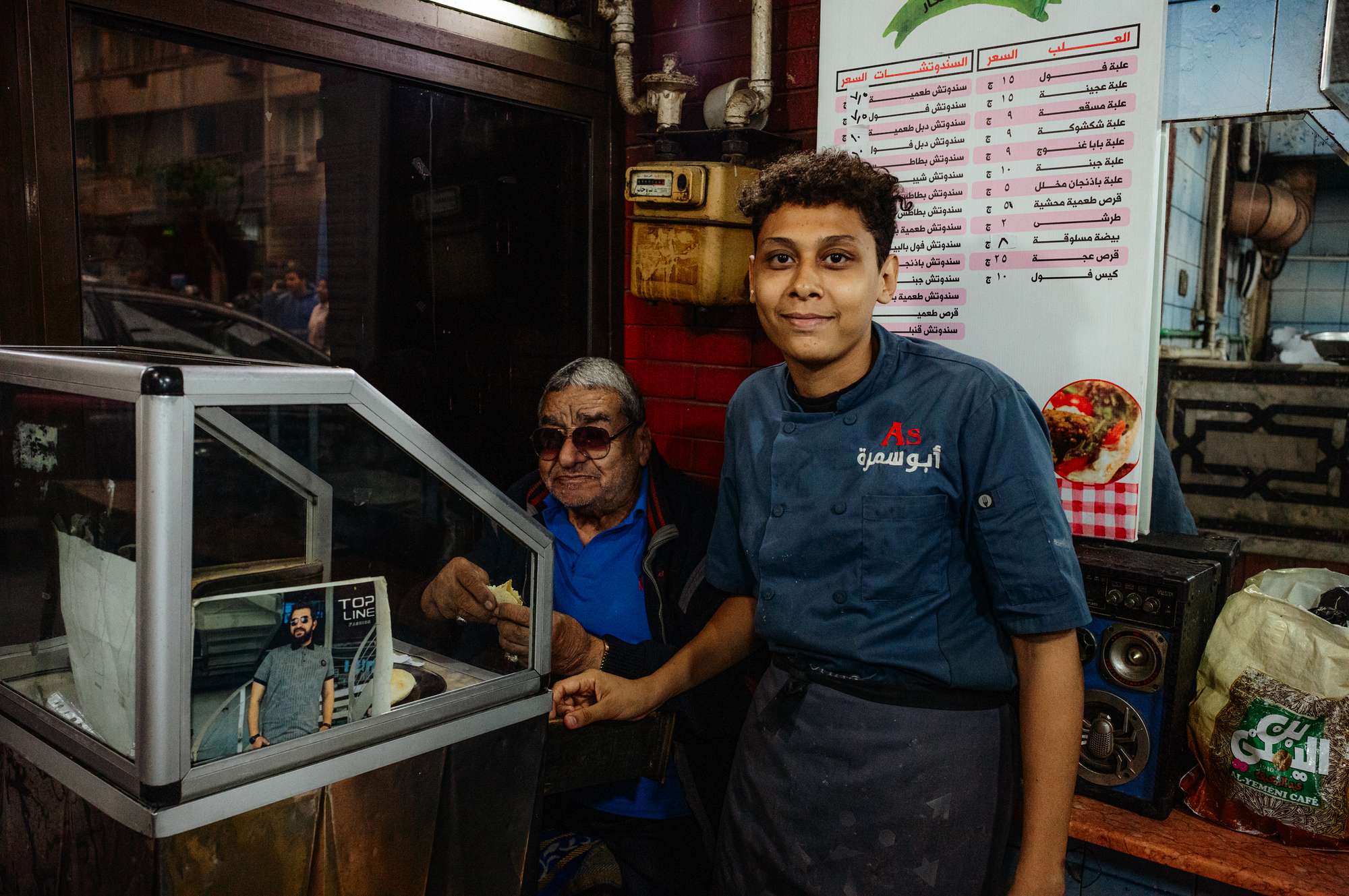 Father and son in their shop