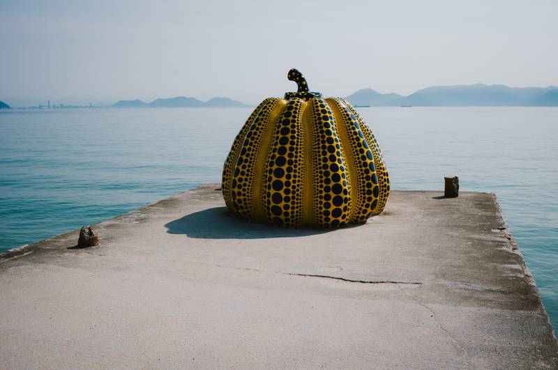 Yayoi Kusama's yellow pumpkin on the Naoshima waterfront
