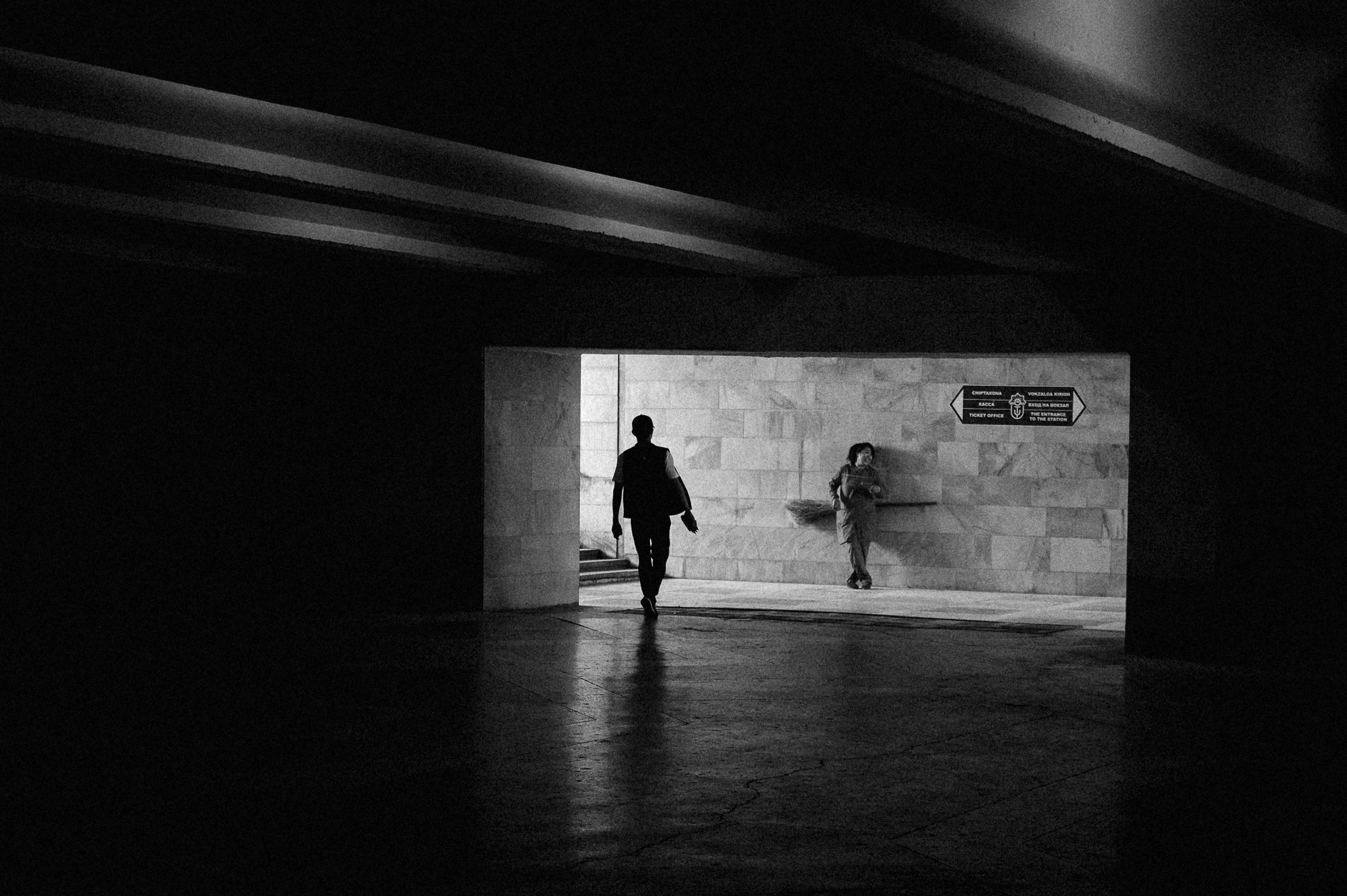 Black and white portrait of two men in rural setting, documentary photography by Evangelos Tzemis