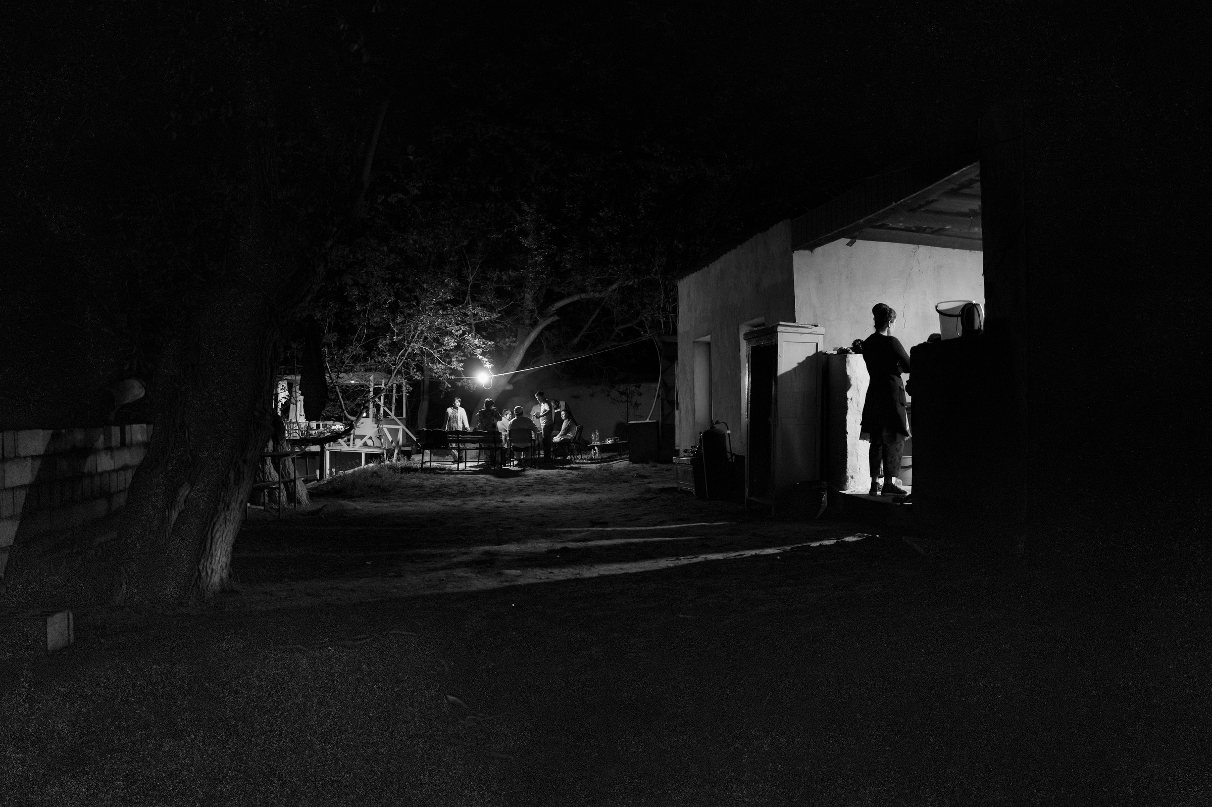 Documentary photograph of children smiling in car, authentic travel photography by Evangelos Tzemis