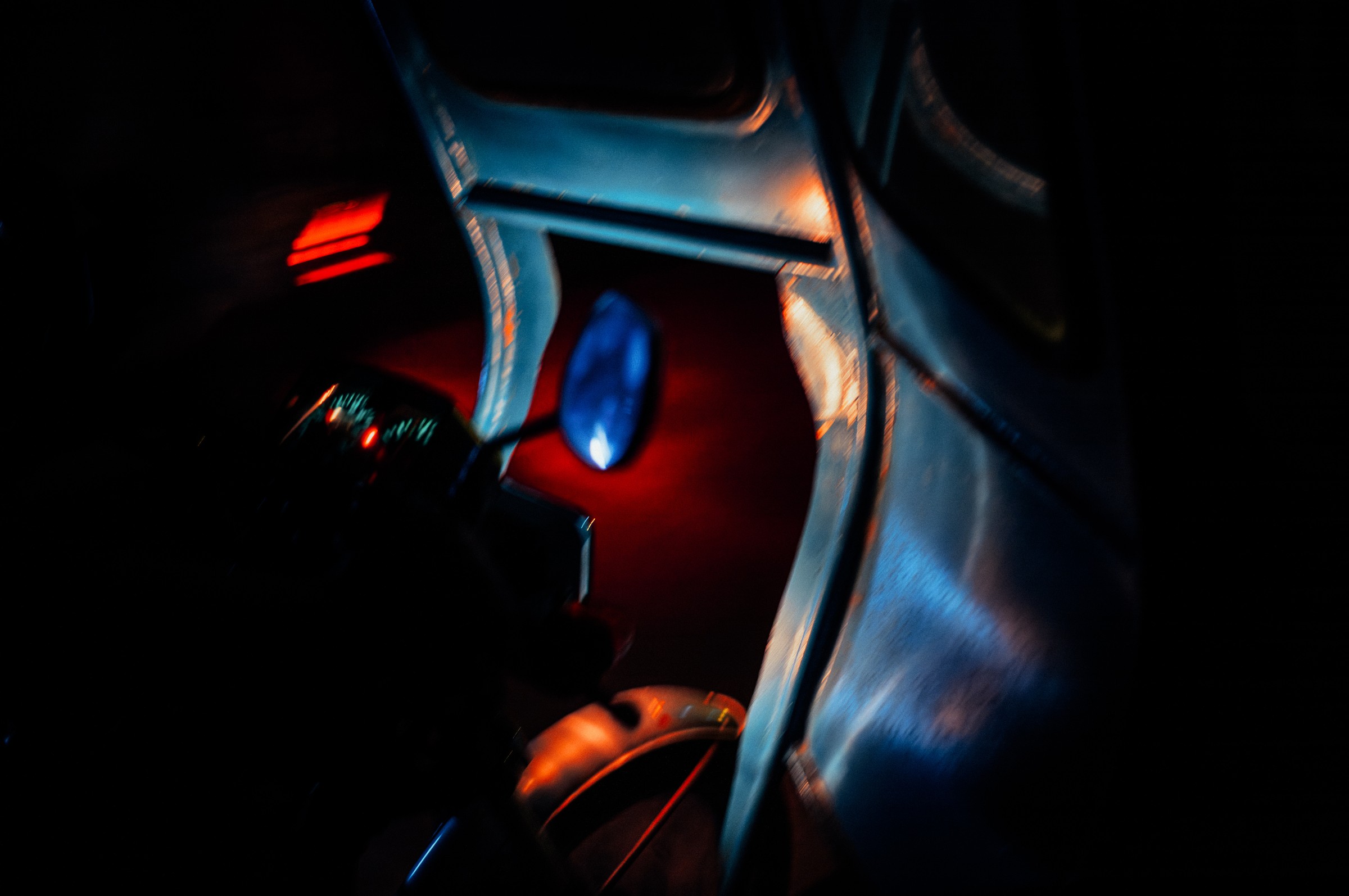 Documentary photograph of children smiling in car, authentic travel photography by Evangelos Tzemis