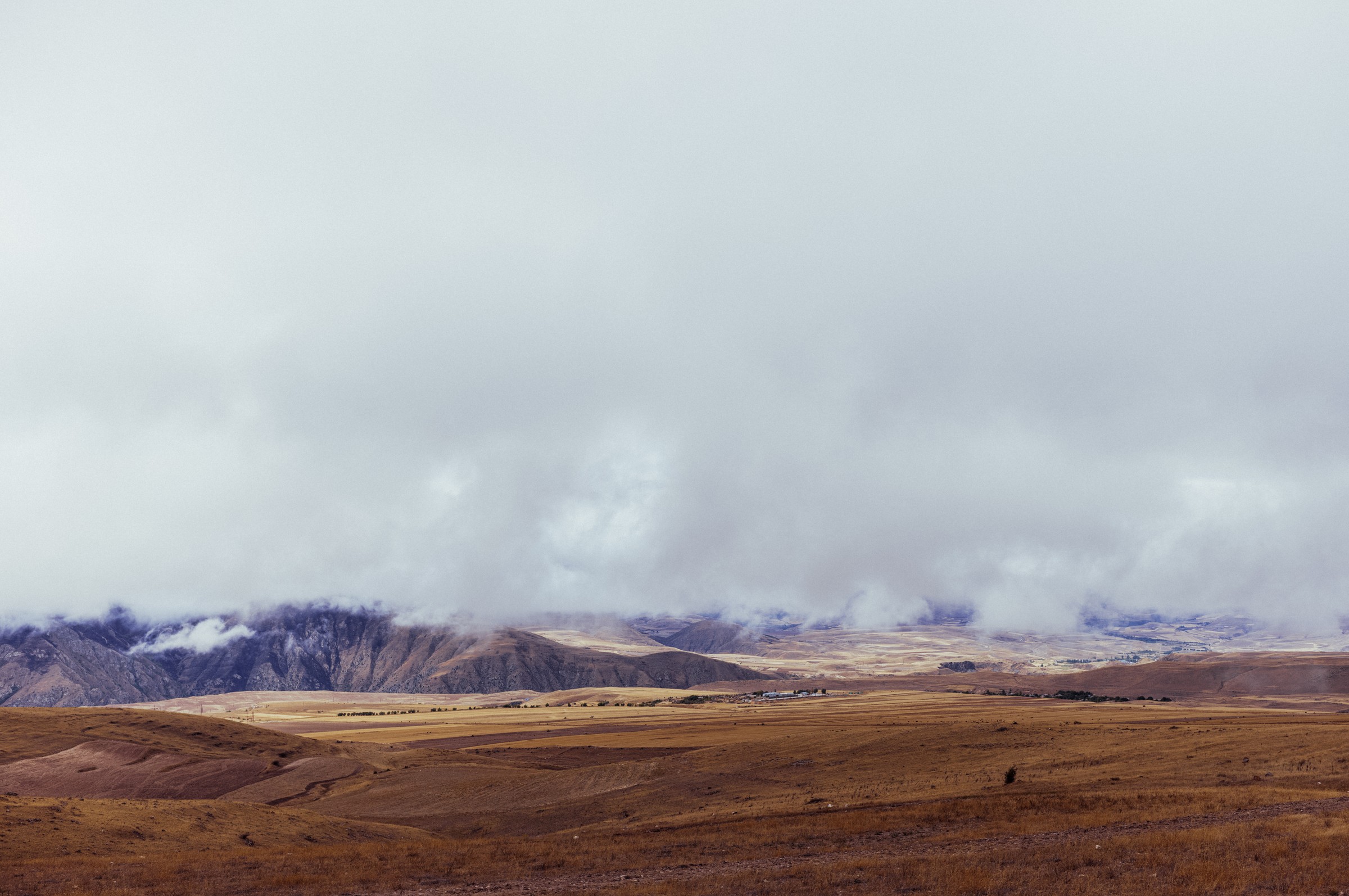Black and white portrait of two men in rural setting, documentary photography by Evangelos Tzemis