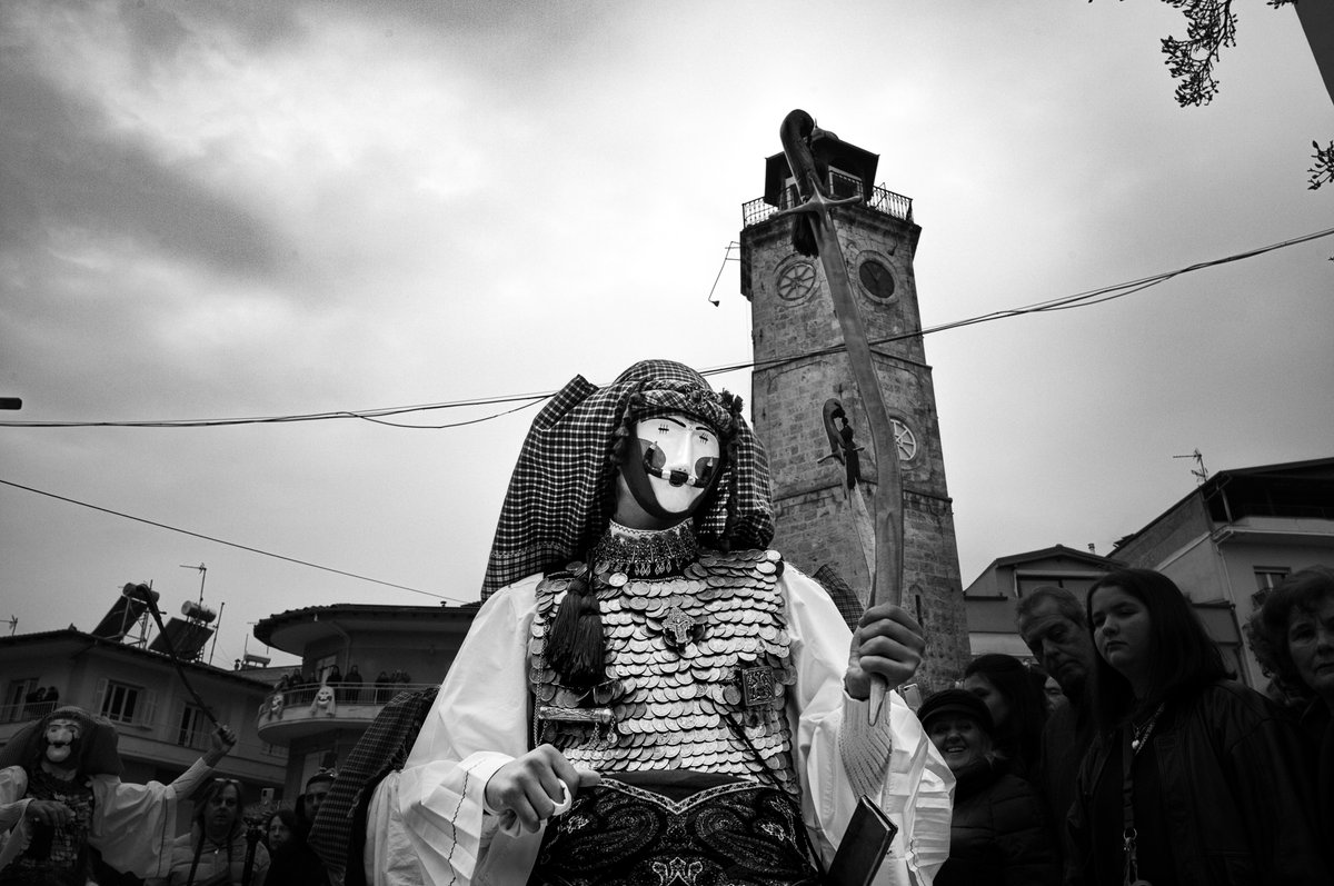 Genitsaros holding his sword upside-down in the clock tower.