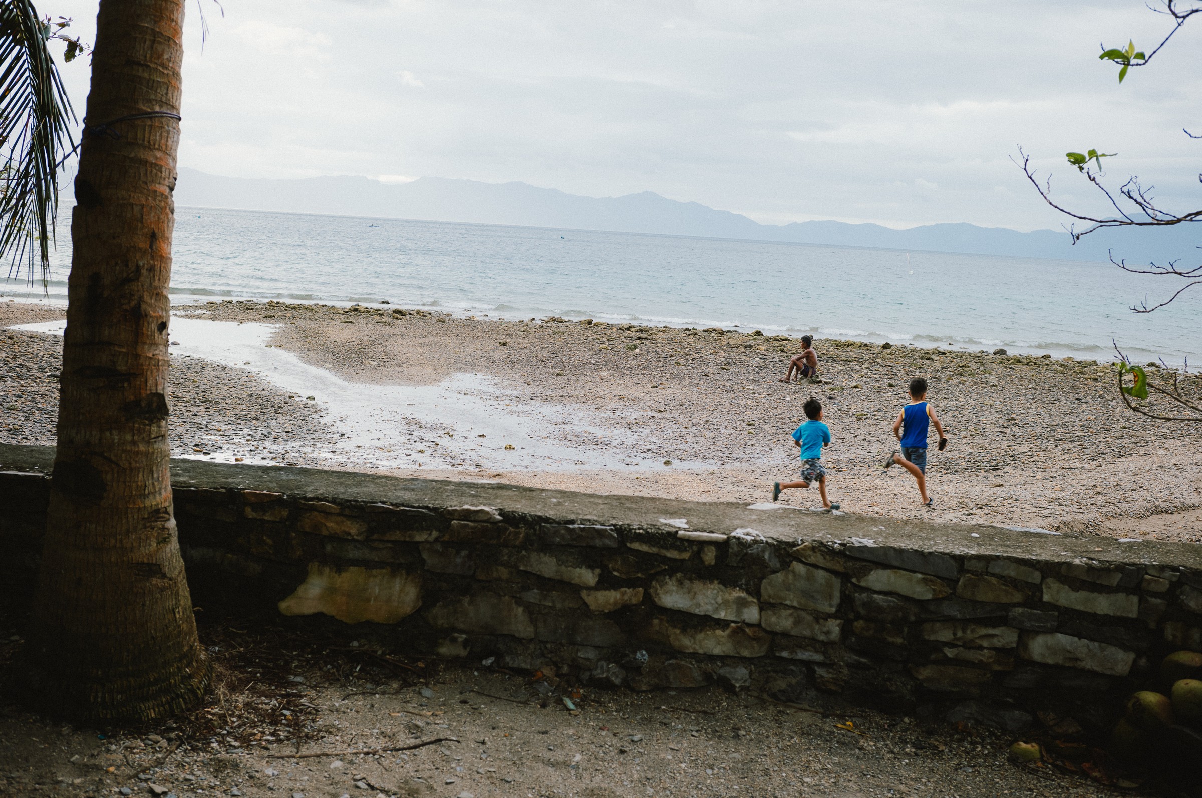 Black and white portrait of two men in rural setting, documentary photography by Evangelos Tzemis