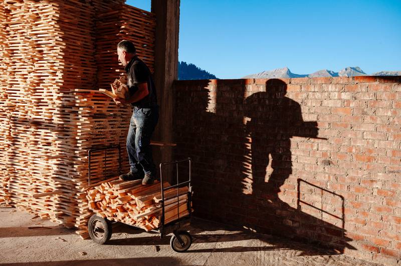 Stacks of drying wood on the upper floor